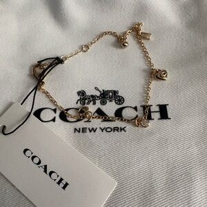 Coach Gold Charm Bracelet with Heart and Round Charms